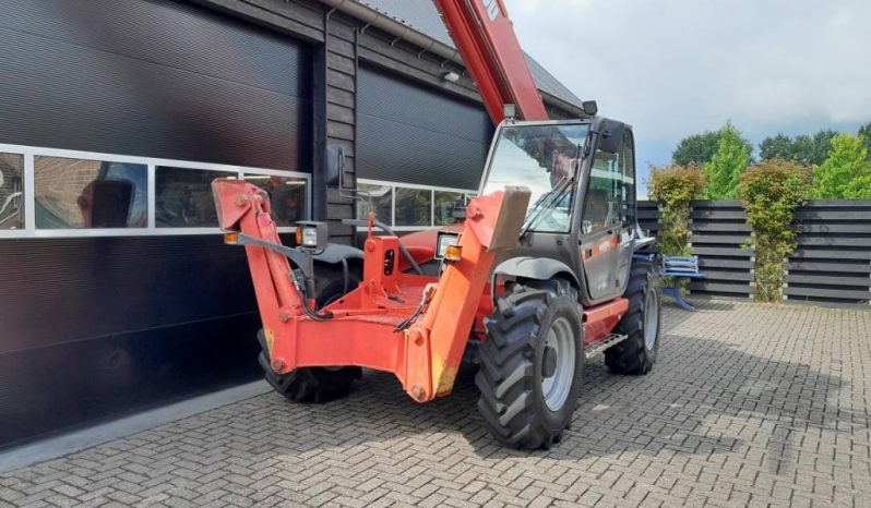 Manitou MT 1440 SL T | Verreiker met vorken vol